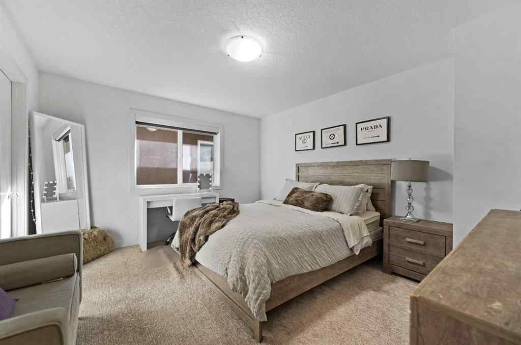 MLS® A2265921 - 129 Springbluff Boulevard SW in Springbank Hill Calgary, Residential