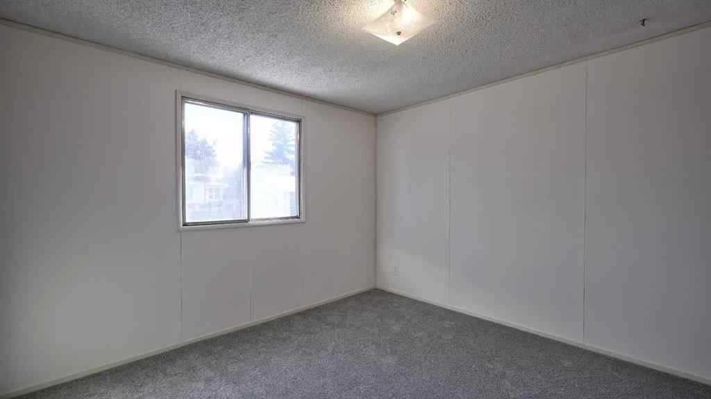 MLS® A2265922 - Unit #90 83 3223 Street NW in Greenview Calgary, Mobile