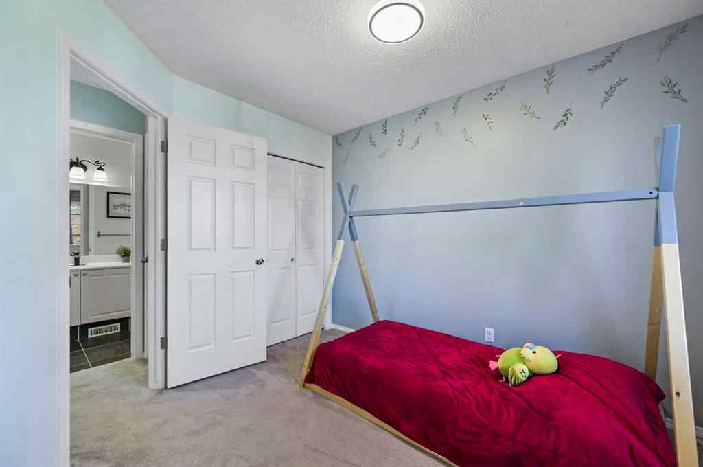 MLS® A2265929 - 67 Hidden Ranch Boulevard NW in Hidden Valley Calgary, Residential