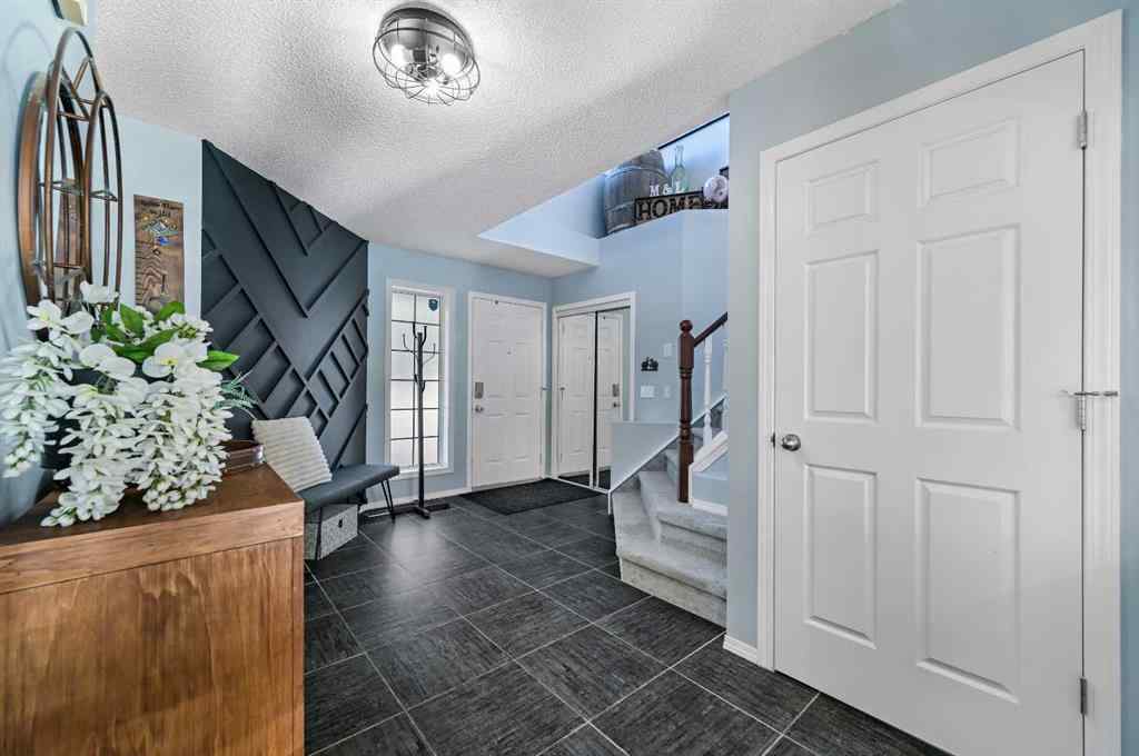 MLS® A2265929 - 67 Hidden Ranch Boulevard NW in Hidden Valley Calgary, Residential