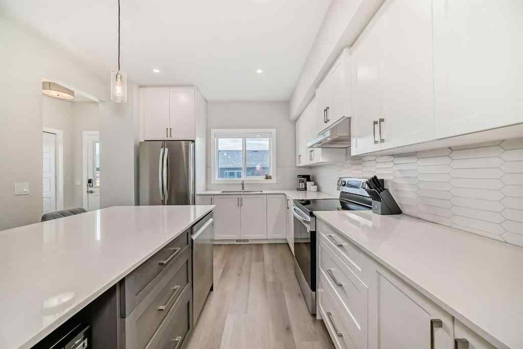 MLS® A2265943 - 934 Cobblemore Common SW in Cobblestone Creek Airdrie, Residential