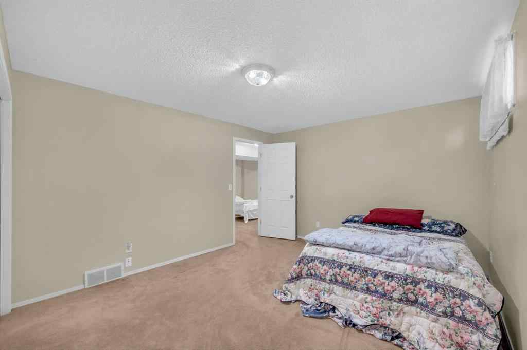 MLS® A2265952 - 65 Tararidge Circle NE in Taradale Calgary, Residential