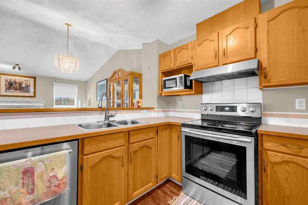 MLS® A2265952 - 65 Tararidge Circle NE in Taradale Calgary, Residential