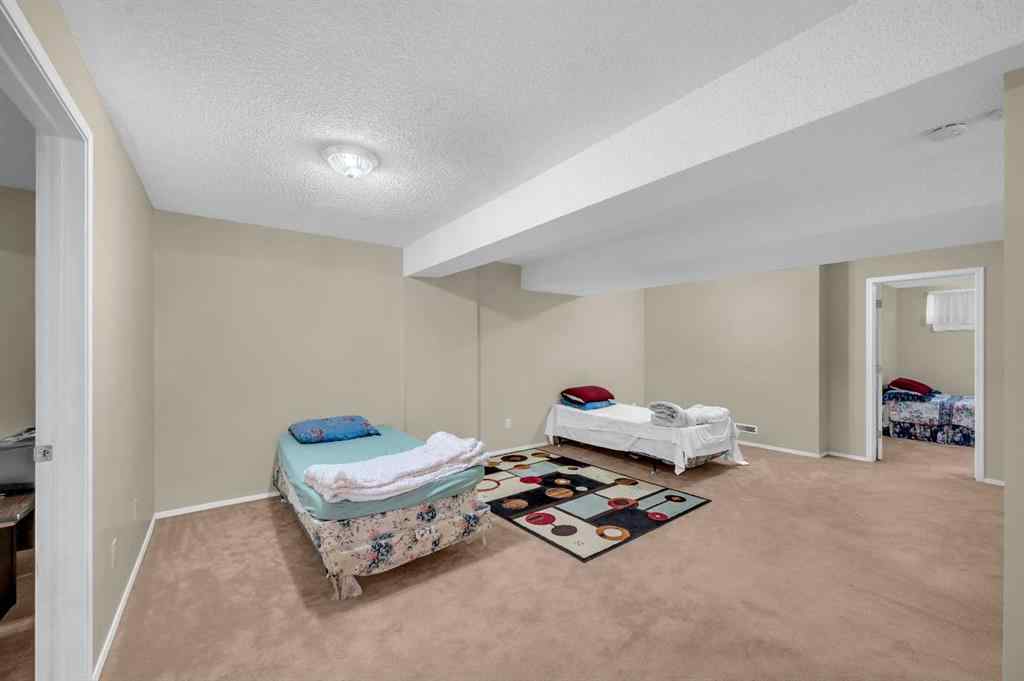 MLS® A2265952 - 65 Tararidge Circle NE in Taradale Calgary, Residential