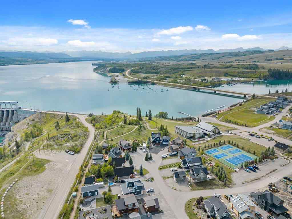 MLS® A2265981 - 256 CottageClub Crescent  in Cottage Club at Ghost Lake Rural Rocky View County, Residential