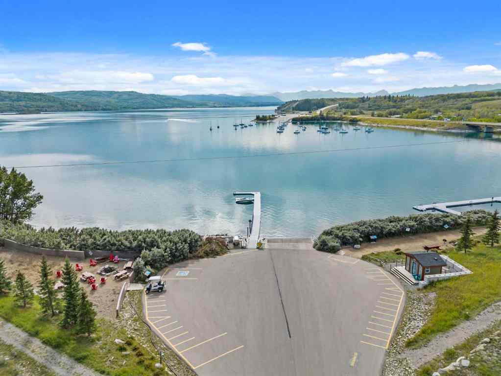 MLS® A2265981 - 256 CottageClub Crescent  in Cottage Club at Ghost Lake Rural Rocky View County, Residential