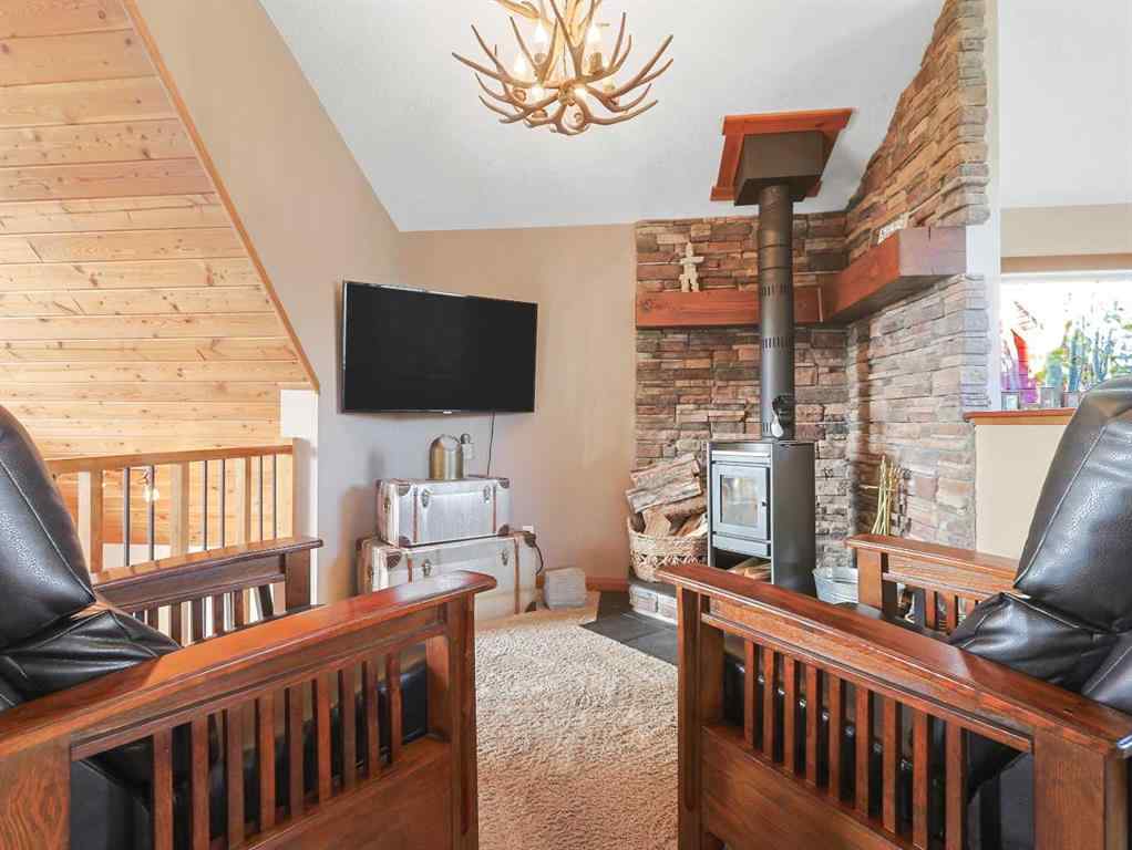 MLS® A2265981 - 256 CottageClub Crescent  in Cottage Club at Ghost Lake Rural Rocky View County, Residential