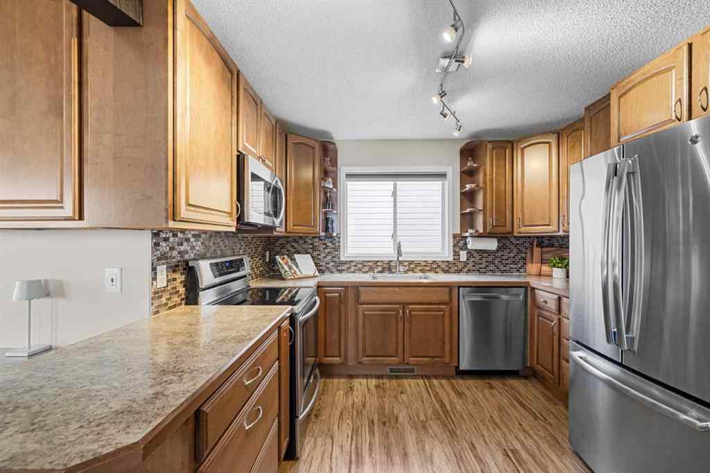 MLS® A2265988 - 92 Hidden Spring Place NW in Hidden Valley Calgary, Residential