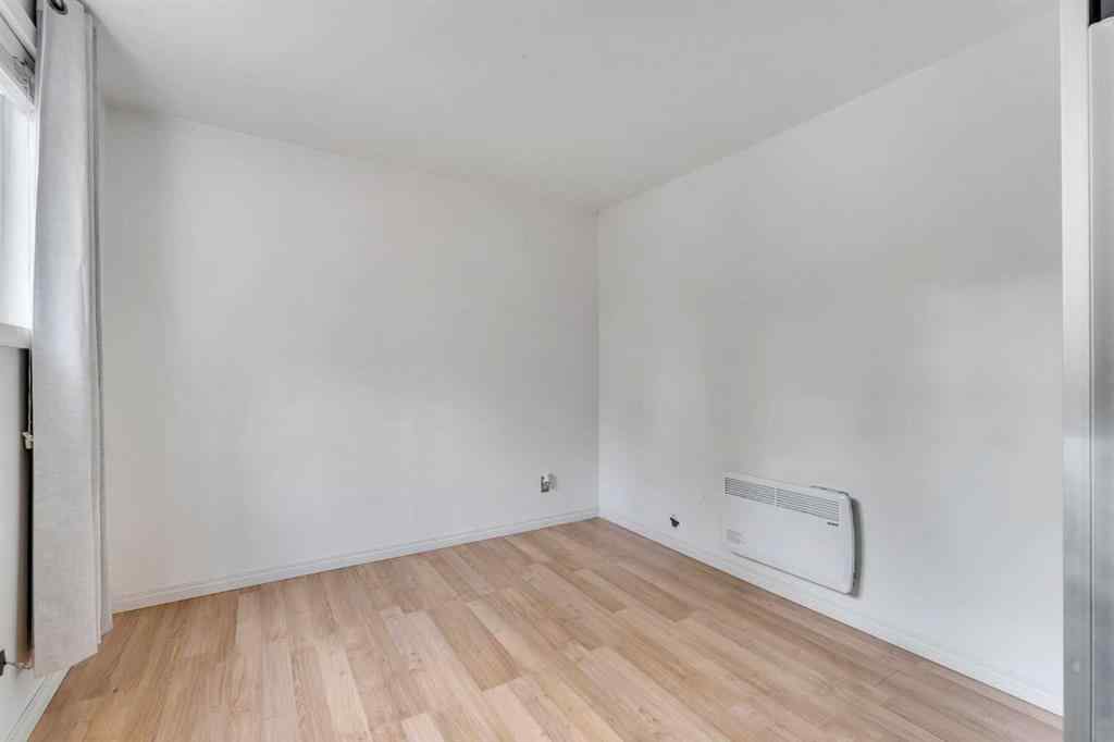 MLS® A2266000 - 314 8 Avenue NE in Crescent Heights Calgary, Residential