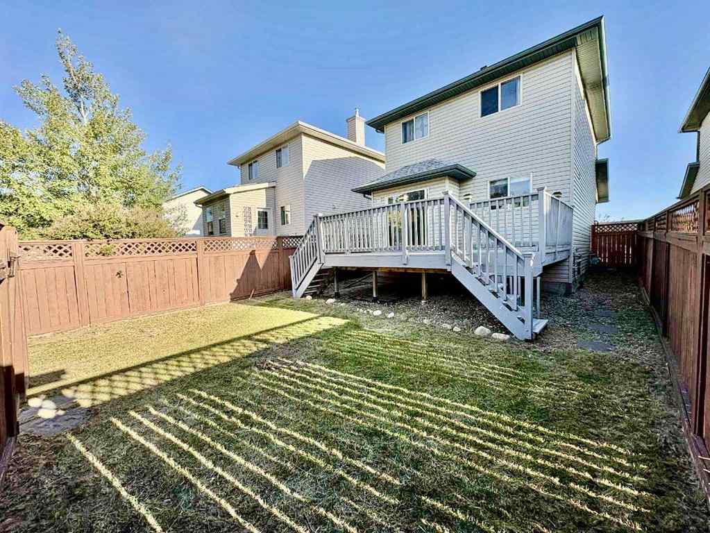 MLS® A2266005 - 911 Arbour Lake Road NW in Arbour Lake Calgary, Residential