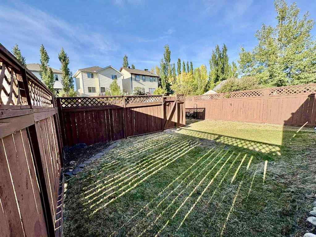MLS® A2266005 - 911 Arbour Lake Road NW in Arbour Lake Calgary, Residential