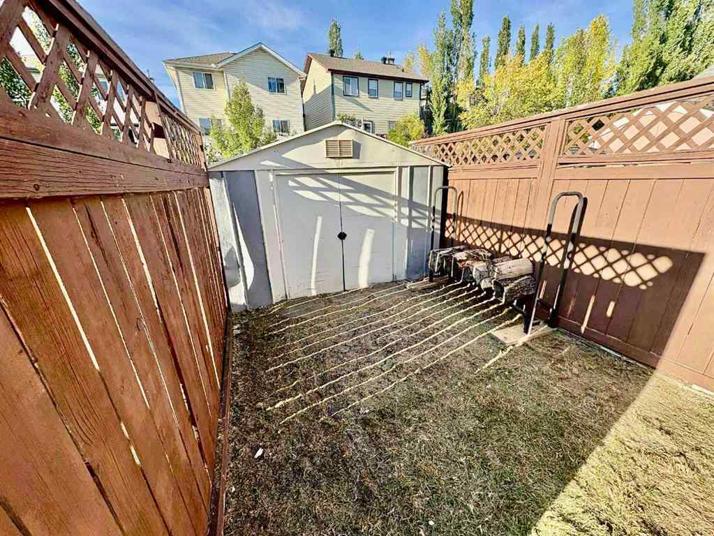 MLS® A2266005 - 911 Arbour Lake Road NW in Arbour Lake Calgary, Residential