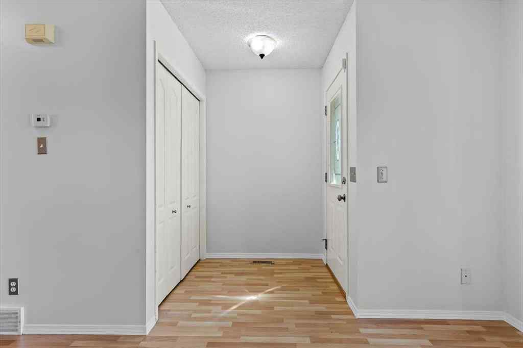 MLS® A2266005 - 911 Arbour Lake Road NW in Arbour Lake Calgary, Residential