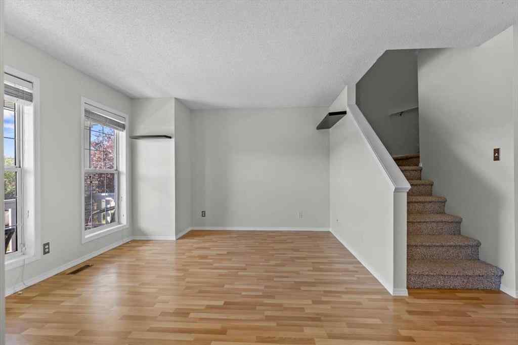 MLS® A2266005 - 911 Arbour Lake Road NW in Arbour Lake Calgary, Residential