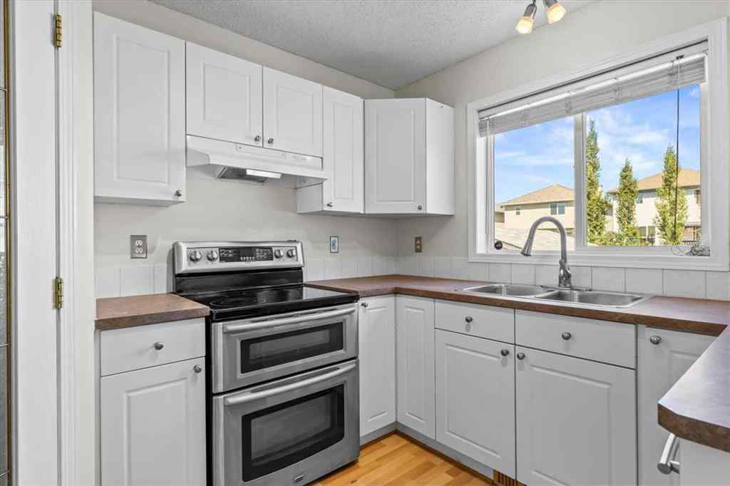 MLS® A2266005 - 911 Arbour Lake Road NW in Arbour Lake Calgary, Residential