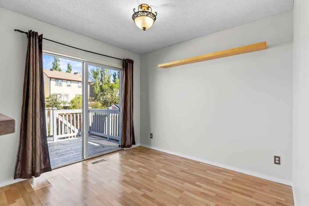 MLS® A2266005 - 911 Arbour Lake Road NW in Arbour Lake Calgary, Residential