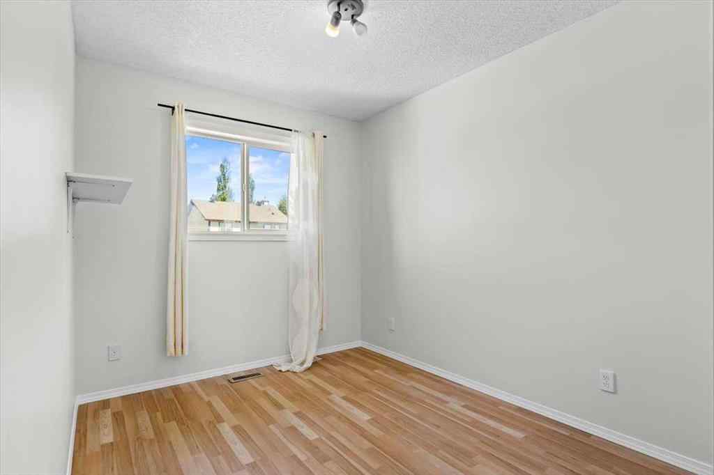 MLS® A2266005 - 911 Arbour Lake Road NW in Arbour Lake Calgary, Residential