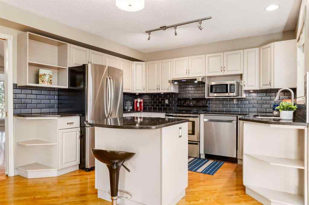 MLS® A2266014 - 118 Sienna Hills Drive SW in Signal Hill Calgary, Residential