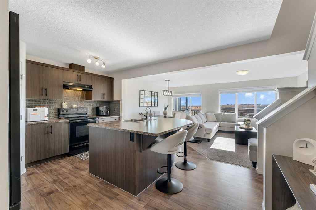 MLS® A2266017 - 209 Hillcrest Square SW in Hillcrest Airdrie, Residential