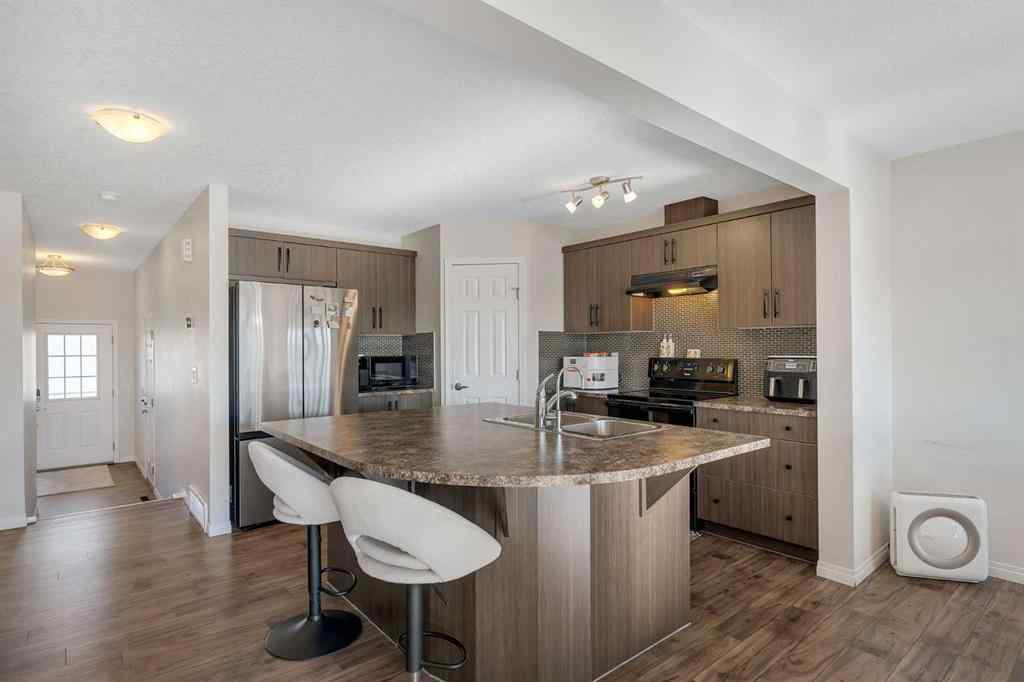 MLS® A2266017 - 209 Hillcrest Square SW in Hillcrest Airdrie, Residential