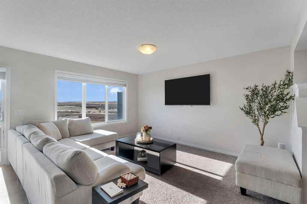 MLS® A2266017 - 209 Hillcrest Square SW in Hillcrest Airdrie, Residential