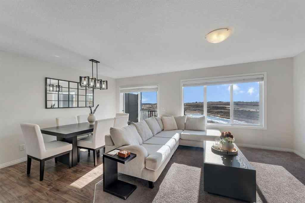 MLS® A2266017 - 209 Hillcrest Square SW in Hillcrest Airdrie, Residential