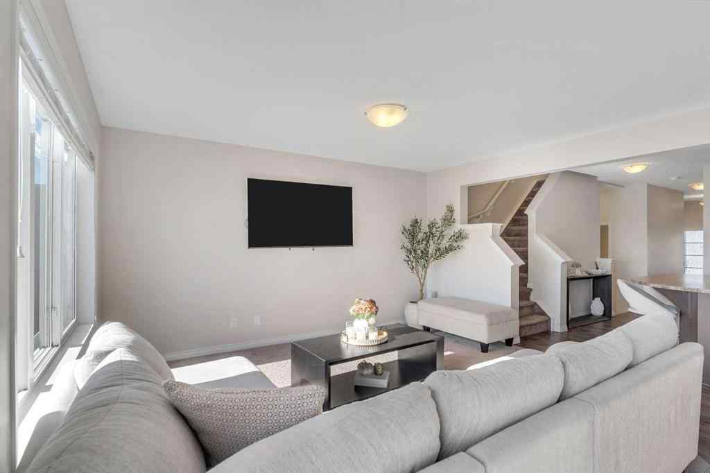 MLS® A2266017 - 209 Hillcrest Square SW in Hillcrest Airdrie, Residential