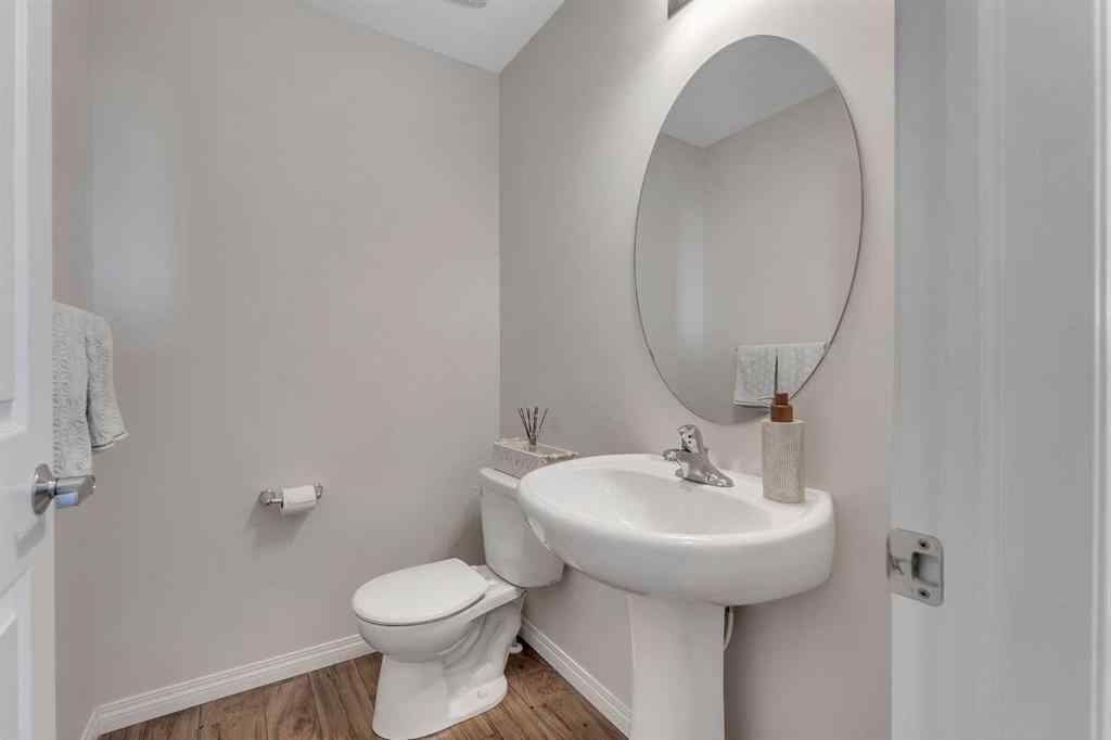 MLS® A2266017 - 209 Hillcrest Square SW in Hillcrest Airdrie, Residential