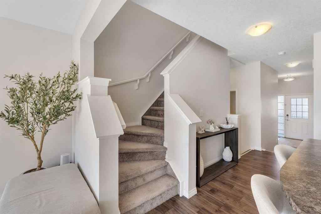MLS® A2266017 - 209 Hillcrest Square SW in Hillcrest Airdrie, Residential