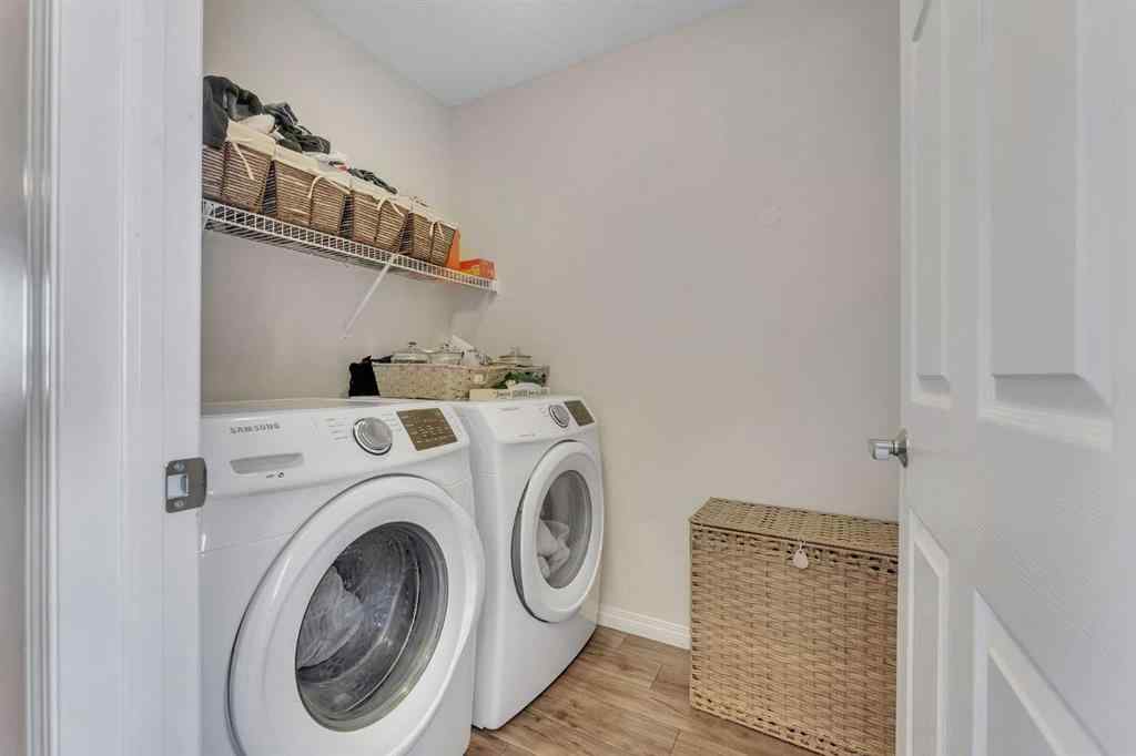 MLS® A2266017 - 209 Hillcrest Square SW in Hillcrest Airdrie, Residential