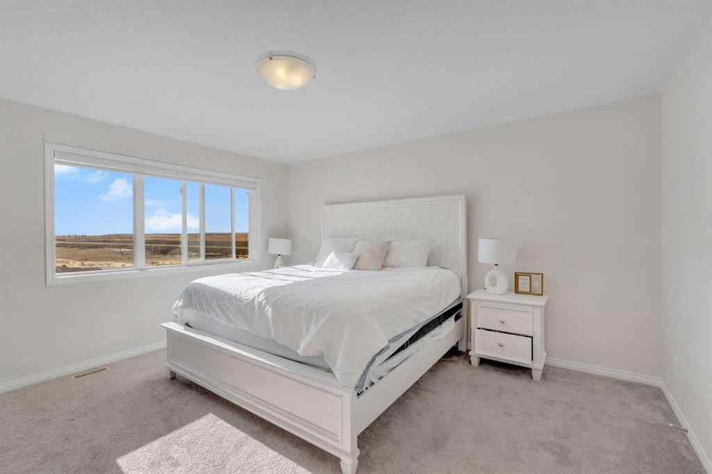 MLS® A2266017 - 209 Hillcrest Square SW in Hillcrest Airdrie, Residential