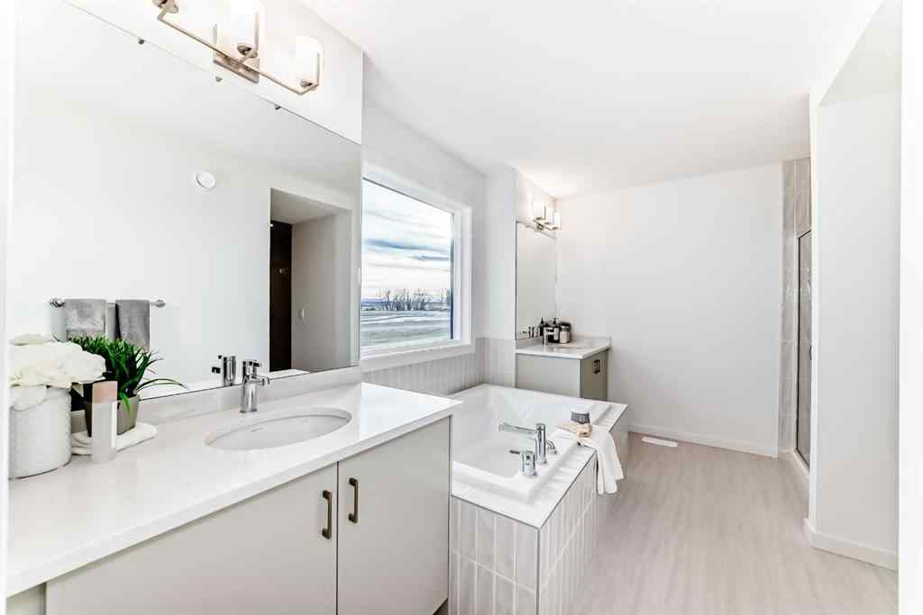 MLS® A2266050 - 59 Versant Way SW in Alpine Park Calgary, Residential