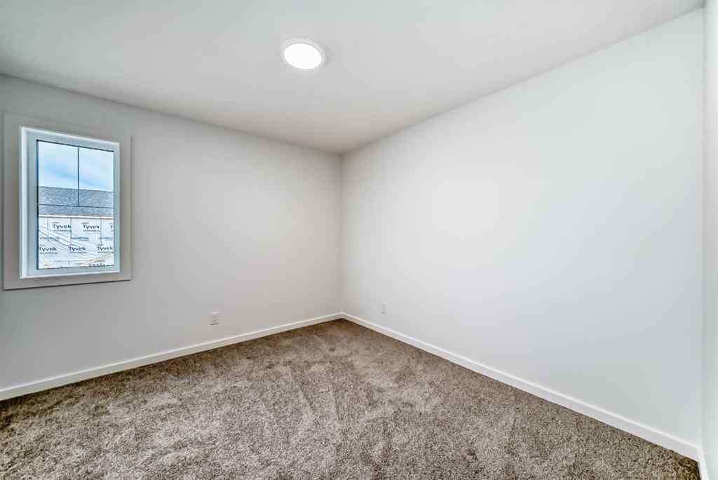 MLS® A2266050 - 59 Versant Way SW in Alpine Park Calgary, Residential