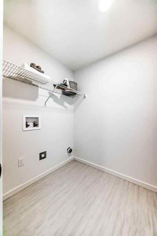 MLS® A2266050 - 59 Versant Way SW in Alpine Park Calgary, Residential