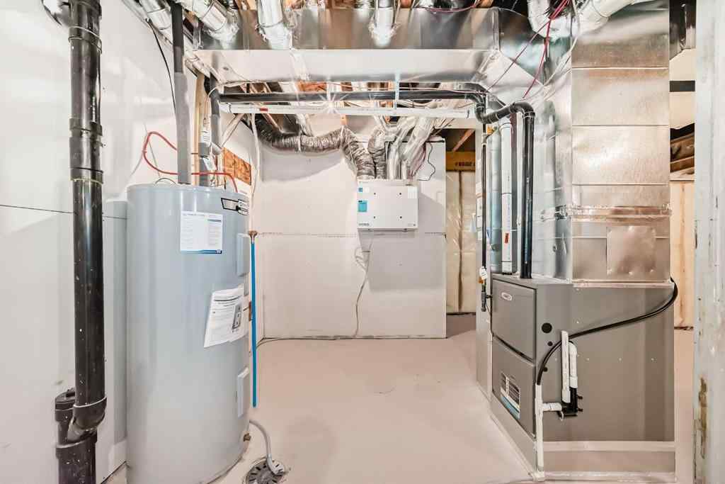 MLS® A2266050 - 59 Versant Way SW in Alpine Park Calgary, Residential