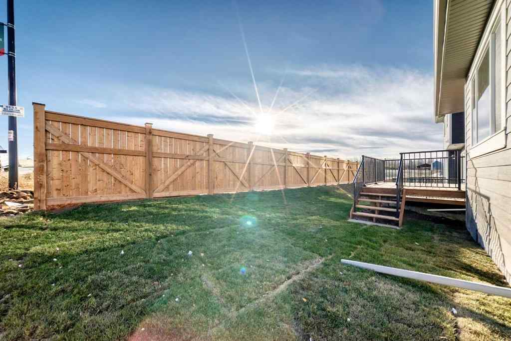 MLS® A2266050 - 59 Versant Way SW in Alpine Park Calgary, Residential