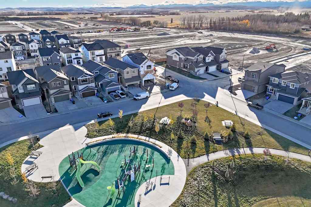 MLS® A2266050 - 59 Versant Way SW in Alpine Park Calgary, Residential