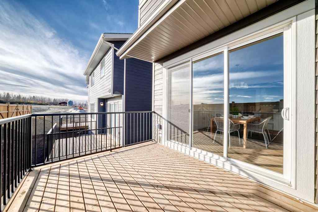 MLS® A2266050 - 59 Versant Way SW in Alpine Park Calgary, Residential