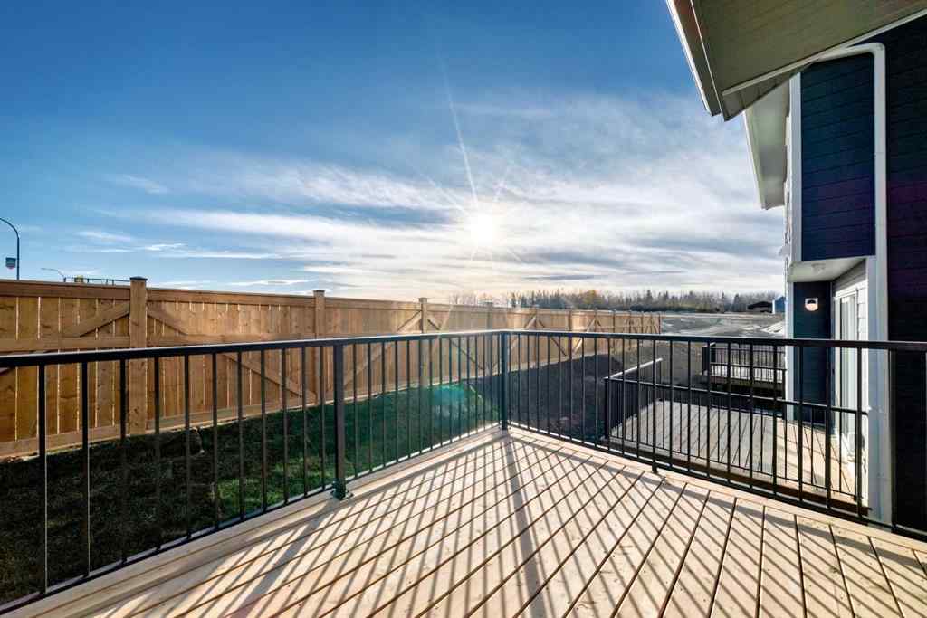 MLS® A2266050 - 59 Versant Way SW in Alpine Park Calgary, Residential