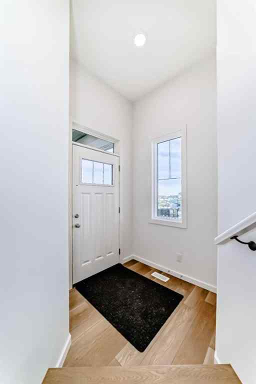 MLS® A2266050 - 59 Versant Way SW in Alpine Park Calgary, Residential