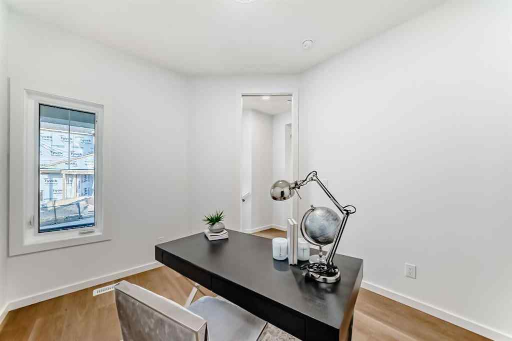 MLS® A2266050 - 59 Versant Way SW in Alpine Park Calgary, Residential