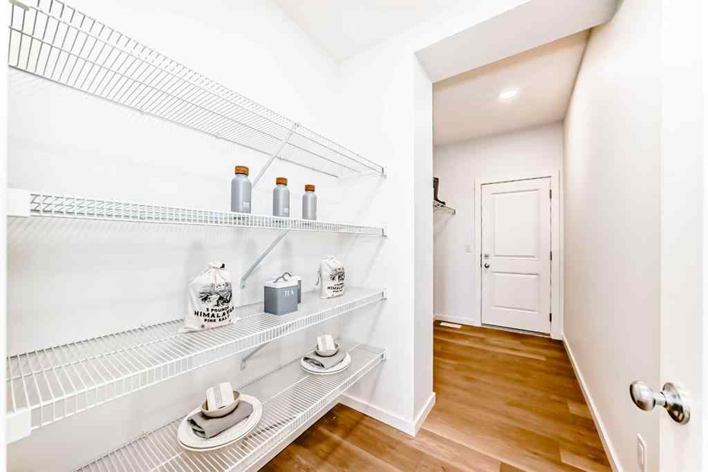 MLS® A2266050 - 59 Versant Way SW in Alpine Park Calgary, Residential