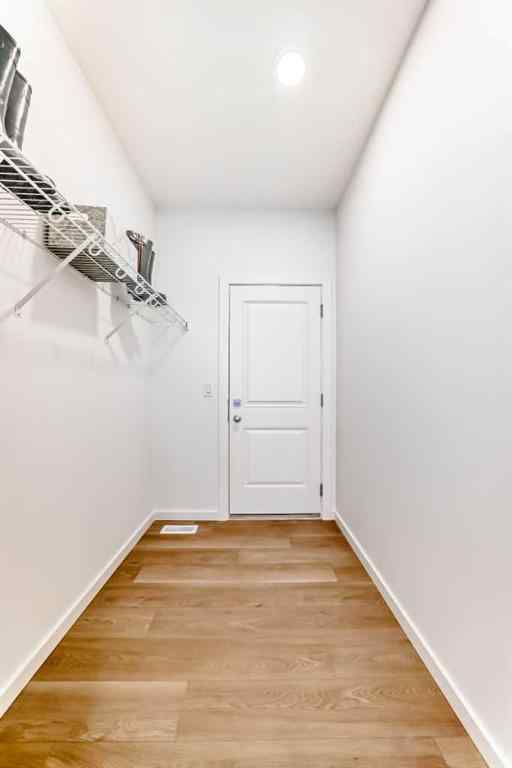 MLS® A2266050 - 59 Versant Way SW in Alpine Park Calgary, Residential