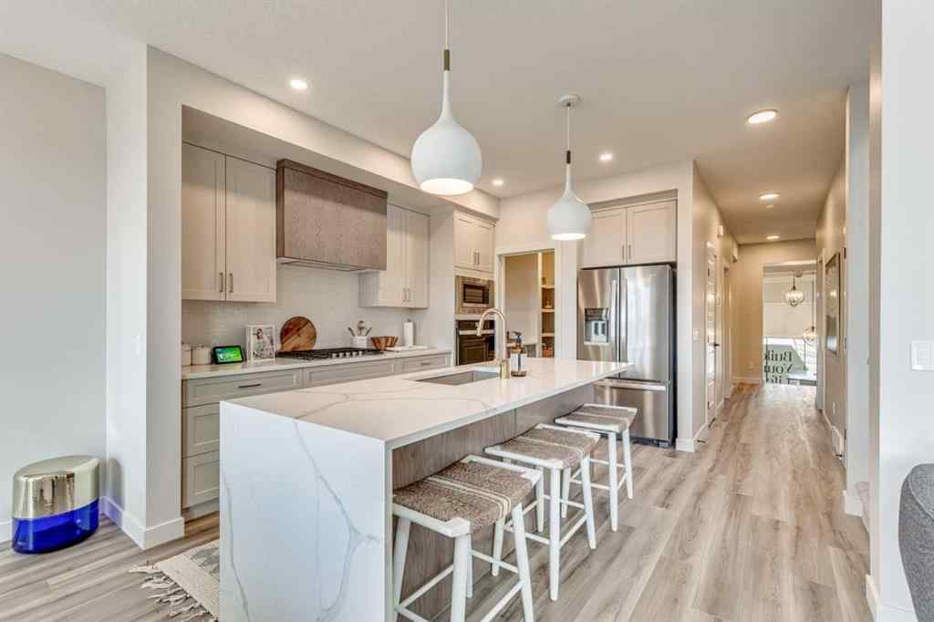 MLS® A2266072 - 97 Monarch Bend  in Harmony Rural Rocky View County, Residential