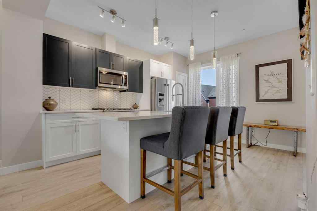 MLS® A2266075 - 158 Livingston Common NE in Livingston Calgary, Residential