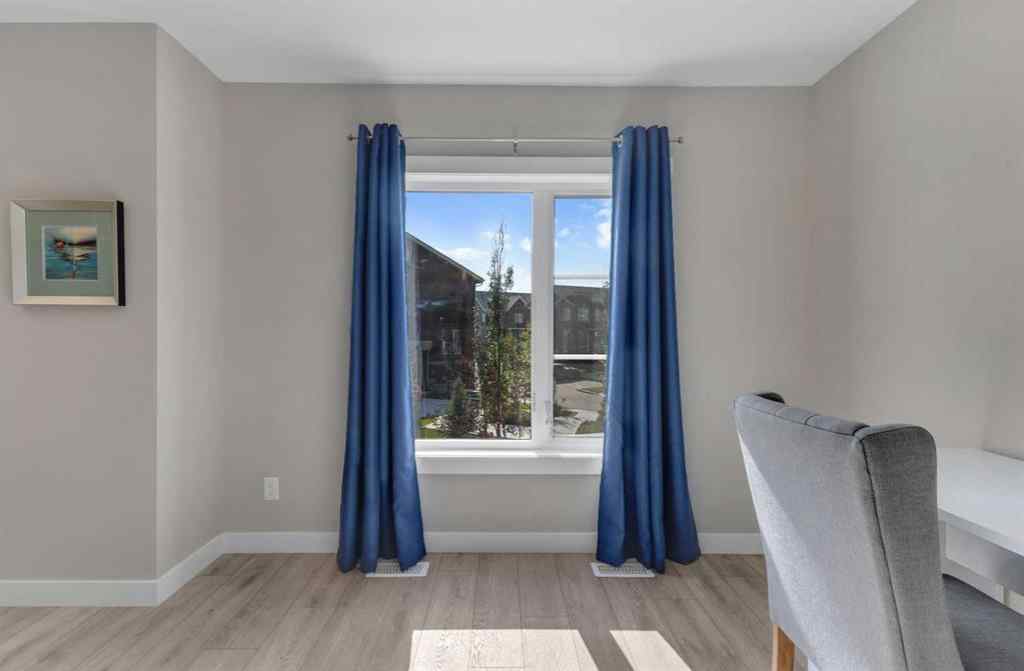 MLS® A2266075 - 158 Livingston Common NE in Livingston Calgary, Residential