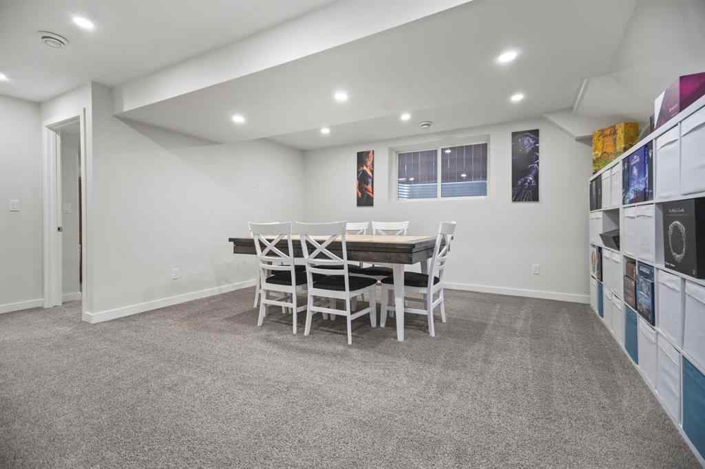 MLS® A2266090 - 411 River Heights Crescent  in River Song Cochrane, Residential