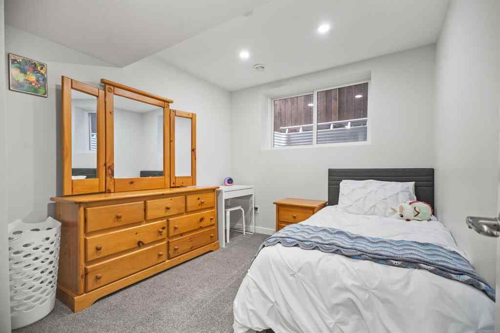 MLS® A2266090 - 411 River Heights Crescent  in River Song Cochrane, Residential