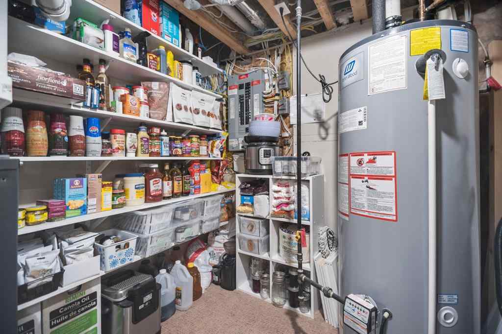 MLS® A2266090 - 411 River Heights Crescent  in River Song Cochrane, Residential