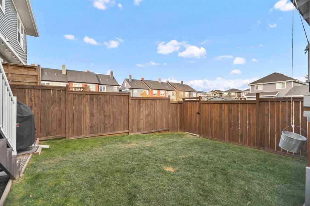 MLS® A2266090 - 411 River Heights Crescent  in River Song Cochrane, Residential